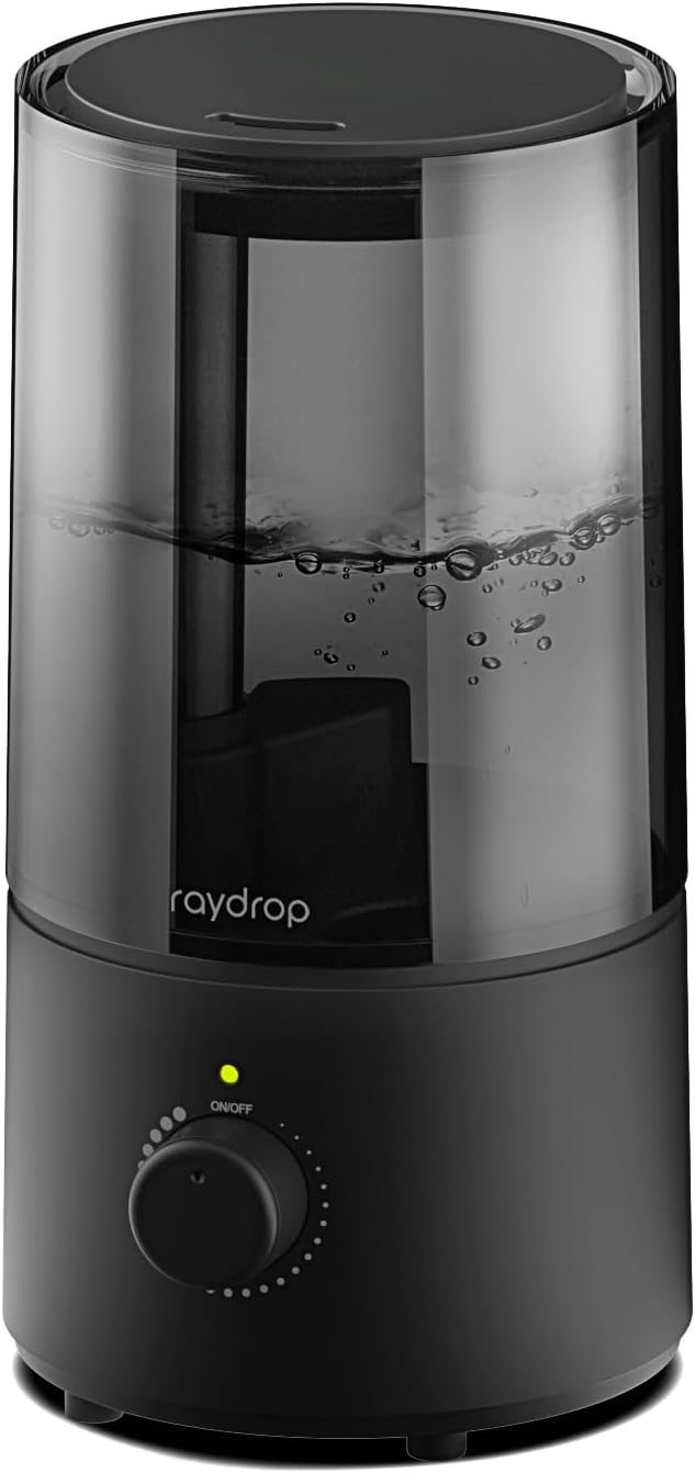 Compact black Raydrop 1L cool mist humidifier with a clear smoked tank, green power light and mist dial